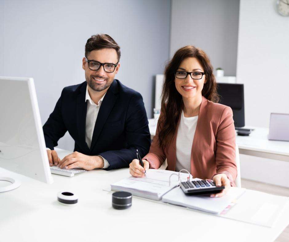 Two accounting professionals research the proper processes when accounting for multiple entities