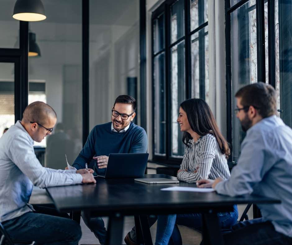 Crypto professionals discussing blockchain applications in business